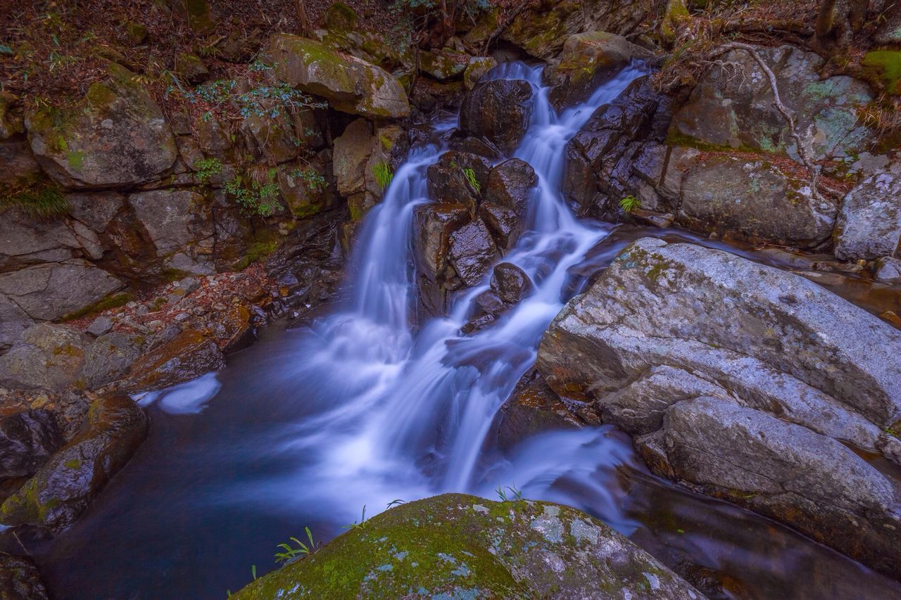 waterfall, flowing water, motion, water, long exposure, flowing, beauty in nature, rock - object, forest, scenics, nature, tree, blurred motion, rock formation, stream, idyllic, tranquility, tranquil scene, environment, power in nature