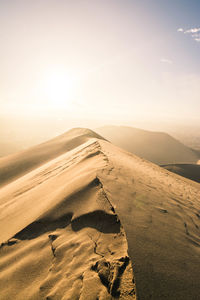 Scenic view of desert against sky