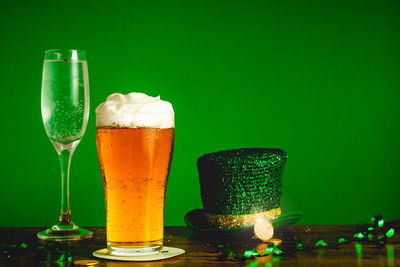 Close-up of beer glass on table