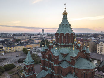 The helsinki cathedral in the background and the orthodox uspenski cathedral in helsinki, finland