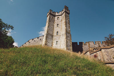 Low angle view of built structure against blue sky