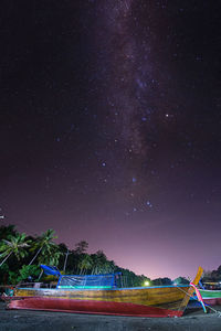 Scenic view of star field against sky at night