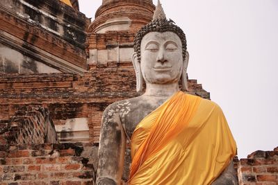 Statue of temple against sky