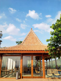 Yogyakarta indonesia 31 may 2021, a cafe building full of glass and wooden chairs at the obelix hill