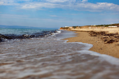 Scenic view of beach against sky