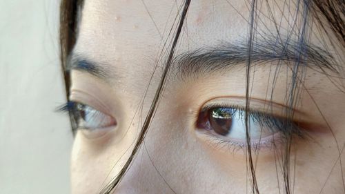 Cropped image of thoughtful woman