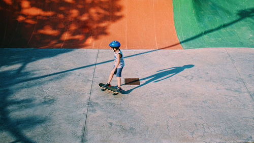 High angle view of skateboard on street in city