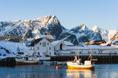 Scenic view of snowcapped mountains against clear sky