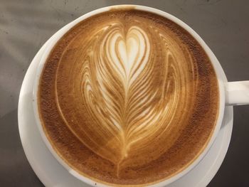 High angle view of cappuccino on table