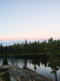 Scenic view of lake at sunset