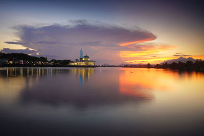 Scenic view of lake against sky during sunset