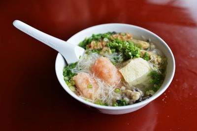 Close-up of yong tau foo served on red table