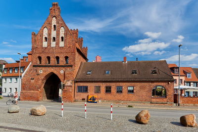 Facade of historic building against sky