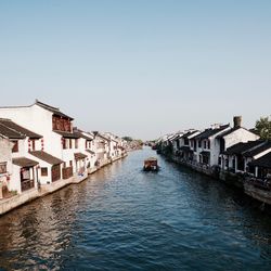 View of canal along buildings