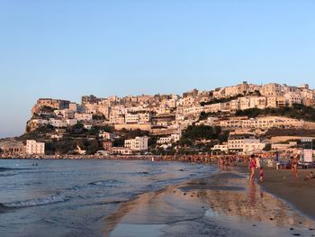 Scenic view of beach against clear sky