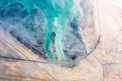 High angle view of sea waves against sky