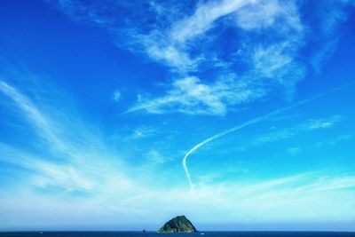 Low angle view of vapor trails in sky