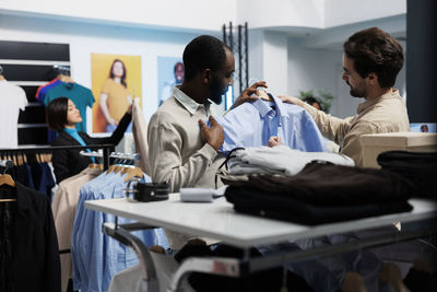 Doctor examining patient in office