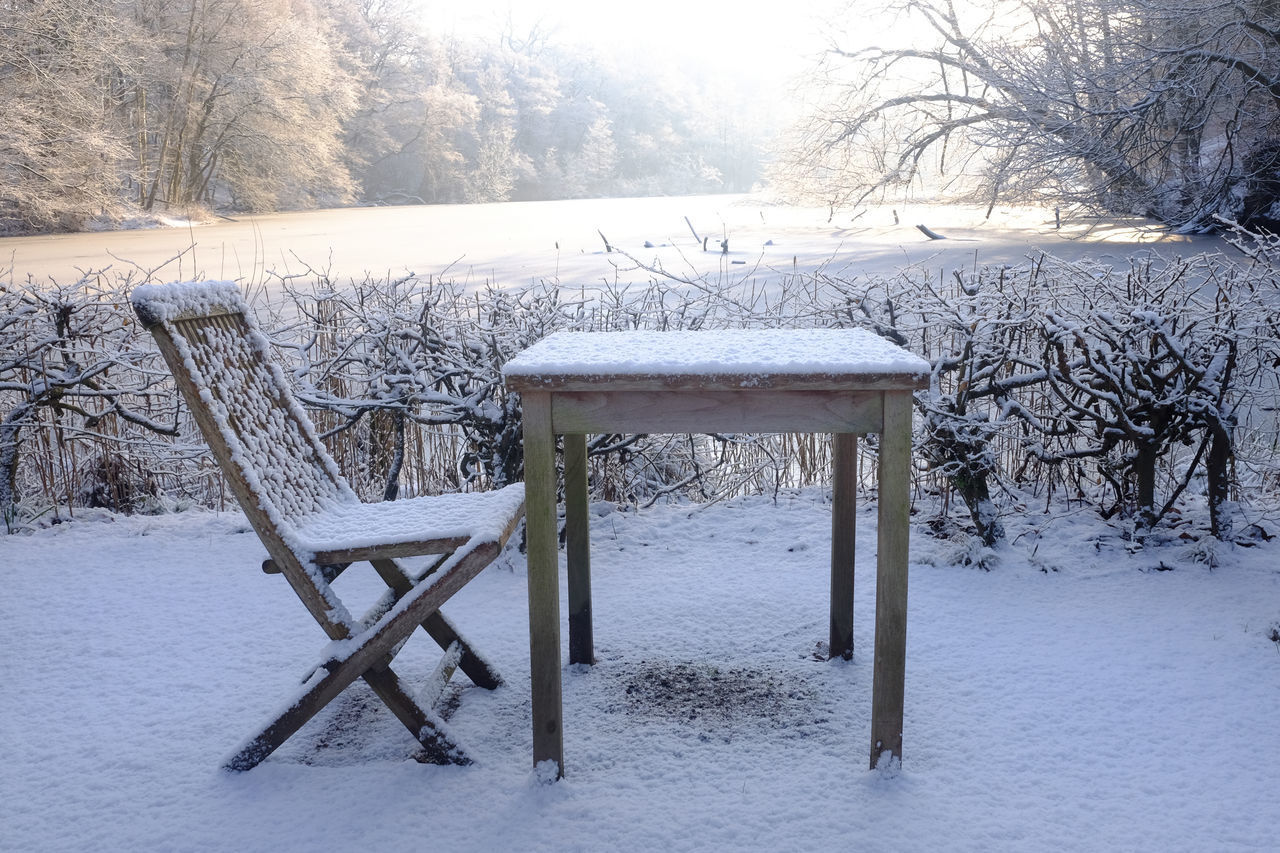 GAZEBO ON SNOW COVERED FIELD