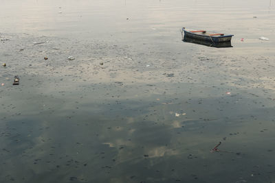 Boats moored on water