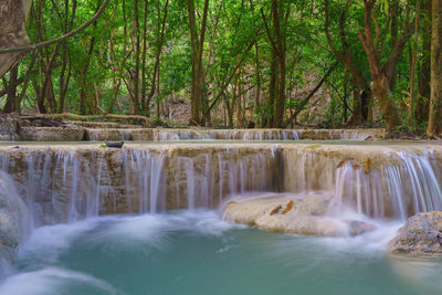 Waterfall in deep rain forest jungle at wang kan luang waterfall, lopburi province thailand.