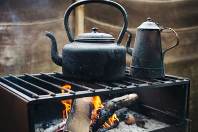 Close-up of teapot on stove