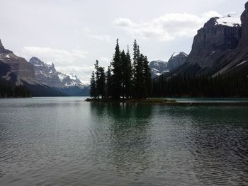 Scenic view of lake with mountains in background