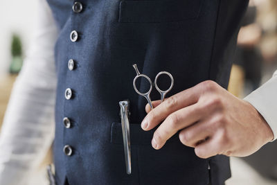 Close-up of woman holding hands