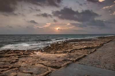 Scenic view of sea against sky during sunset