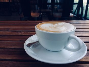 Close-up of cappuccino on table