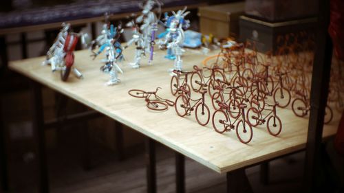 High angle view of figurines arranged on table