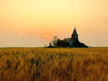 Smokey sunset over abandoned church