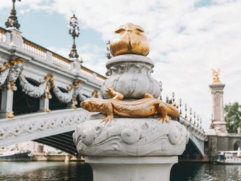 Statue and bridge