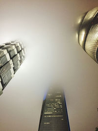 Low angle view of modern buildings in city