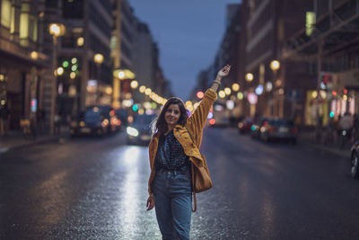 Portrait of young woman on street