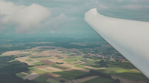 Aerial view of agricultural landscape against sky