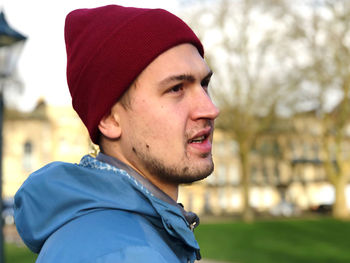 Portrait of young man looking away