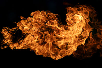 Close-up of fire against black background