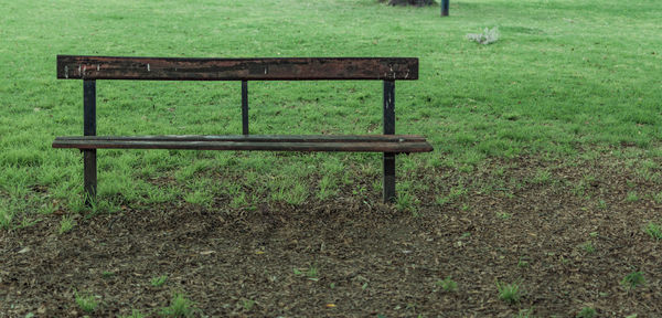 Empty bench in park