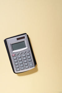 High angle view of calculator on table