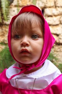 Portrait of cute girl wearing scarf