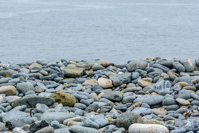 Stones on rocks at beach