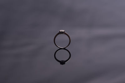 Close-up of wedding rings on metal