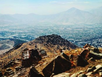 Scenic view of landscape and mountains against sky