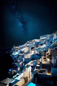 High angle view of buildings at night