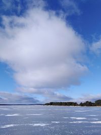 Scenic view of sea against sky during winter