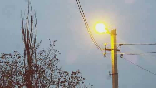 High section of electricity pylon against sky