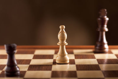 Close-up of chess pieces against blurred background