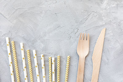 High angle view of wooden spoons on table