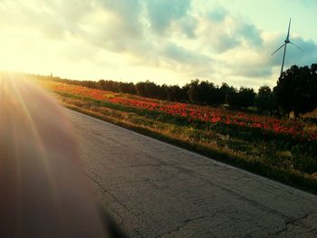 Scenic view of field against sky during sunset